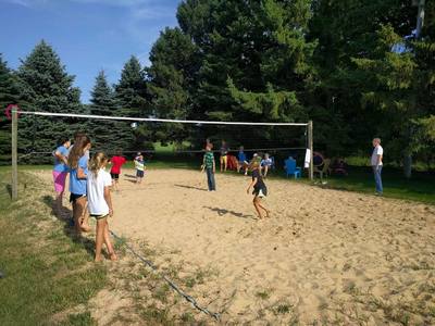 Large family reunion resort with sand volleyball in Michigan